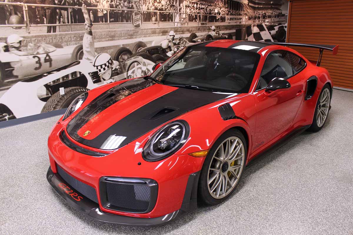 auto ceramic coating for red and black car in Lilburn